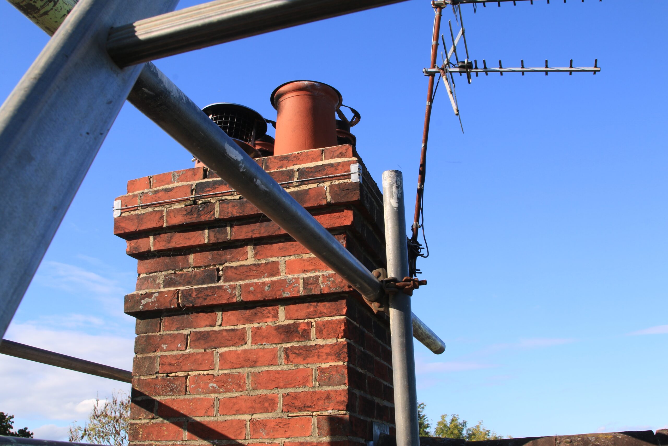 Old,Brick,Chimney,Stack,In,Need,Of,Repointing